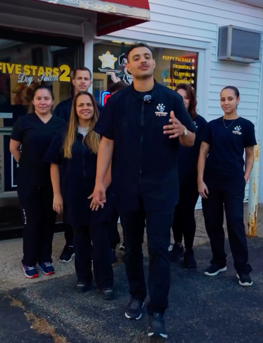 The Five Star Dog Salon team standing outside the salon